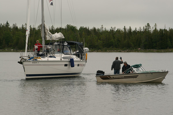 Windchaser being towed